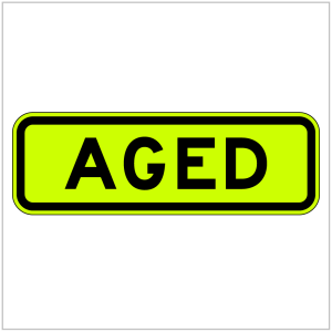 W8-18 – Green "AGED" Sign in black text produced by ASAP Signs