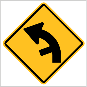 W2-10 SIDE ROAD JUNCTION ON A CURVE - WARNING SIGNS