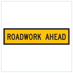 TM1-1B – ROADWORK AHEAD-A bright yellow roadwork ahead sign with black text, indicating upcoming construction or maintenance on the road