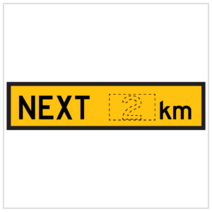 TM1-36B A yellow road sign indicating the next 2 kilometers ahead