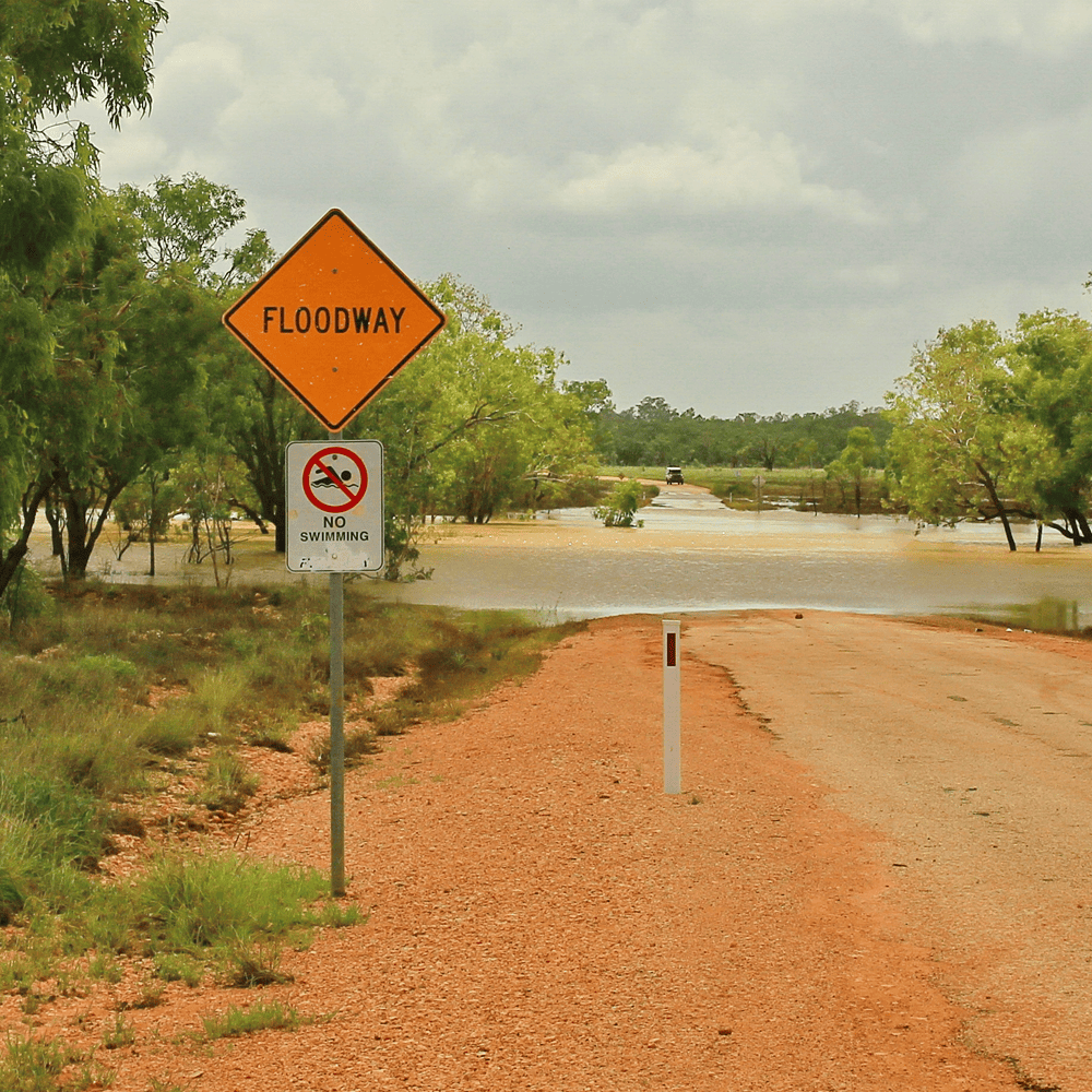 Quality Signage Materials - Sturdy signage placed near a floodway
